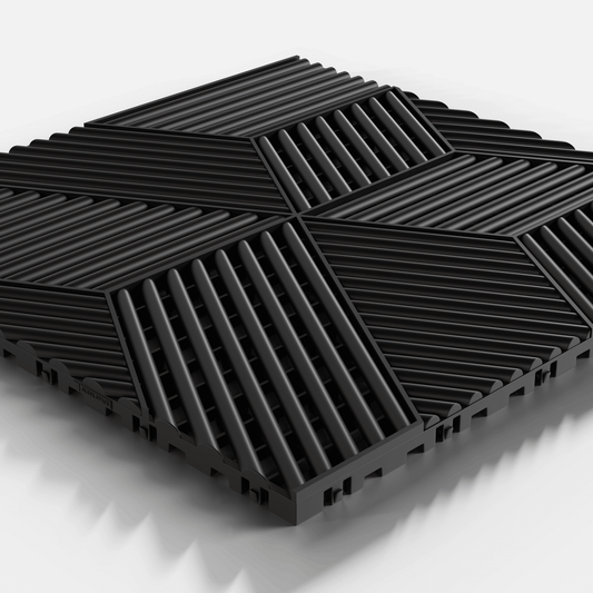 ULTRACUBE garage floor tile in Jet Black, single tile seen from a low angle