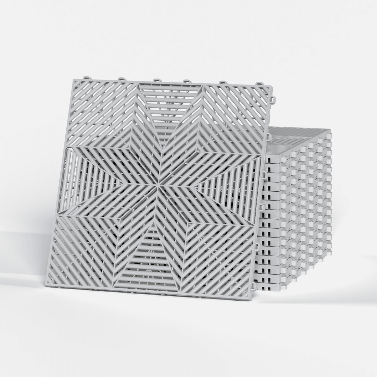 ULTRAFLUX garage floor tile in Glacier Grey, a stack of tiles