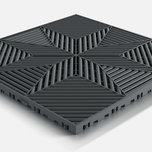 ULTRAFLUX garage floor tile in Stealth Grey, single tile seen from a low angle
