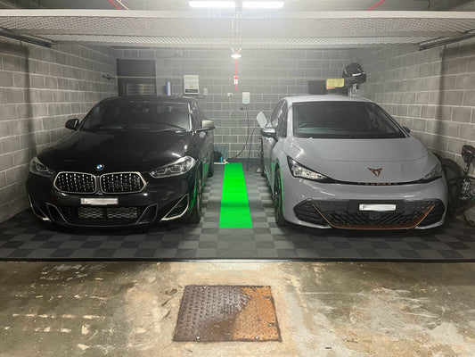 Durable Sleek Space garage floor tiles with car parked