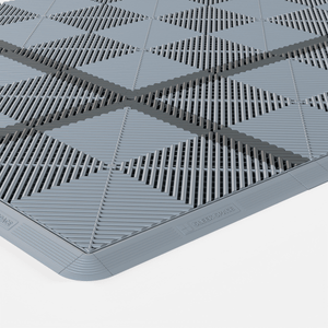 CORDLINK cable management in Space Grey, two runs crossing a vented tile floor