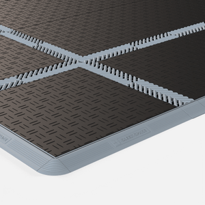 CORDLINK cable management in Silver Grey, two runs crossing a tile floor