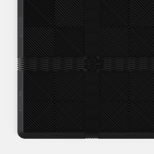 EXTENDER Strips in Jet Black clicked in between ULTRAGRID® tiles, with a Corner where the strips cross