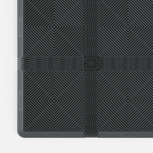 EXTENDER Strips in Space Grey clicked in between ULTRAGRID® tiles, with a Corner where the strips cross