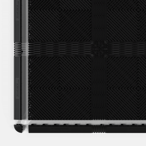 EXTENDER Strips in Jet Black in an ULTRAGRID® floor with the edge ramps lifted away