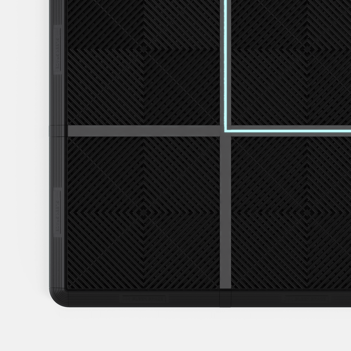 LED channels lit in a Jet Black floor, a line of light where the tiles meet