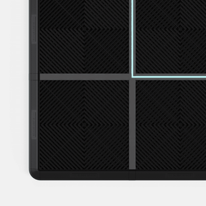 LED channels lit in a Jet Black floor, a line of light where the tiles meet
