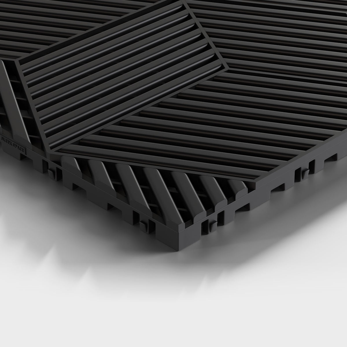 ULTRACUBE tile in Jet Black: one corner seen low and close