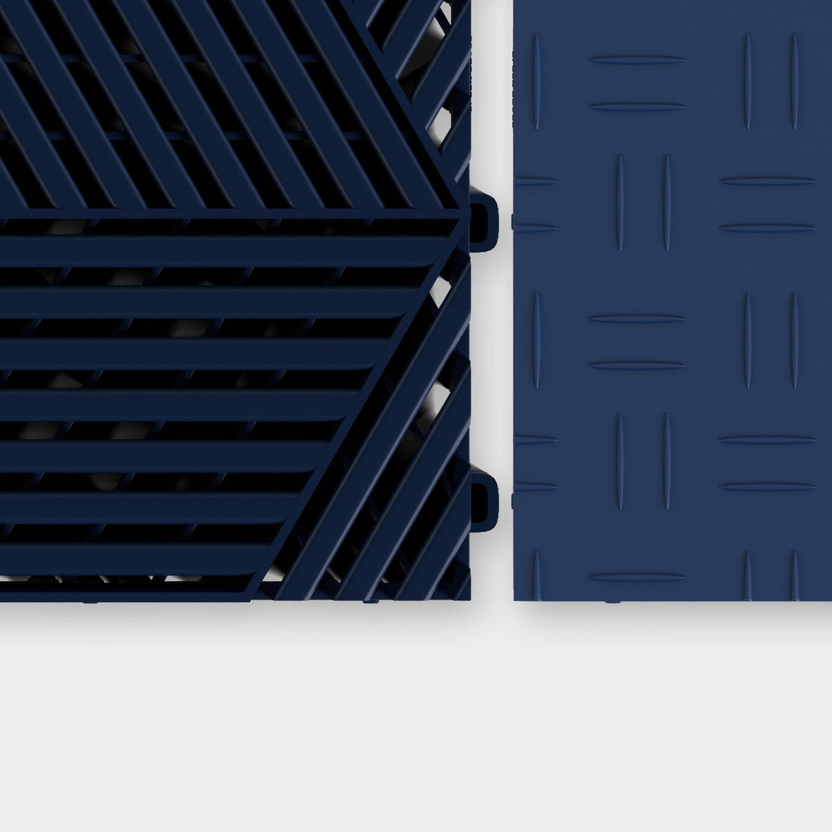 ULTRACUBE tile in Night Blue beside an ULTRATUFF tile in Night Blue, about to click together