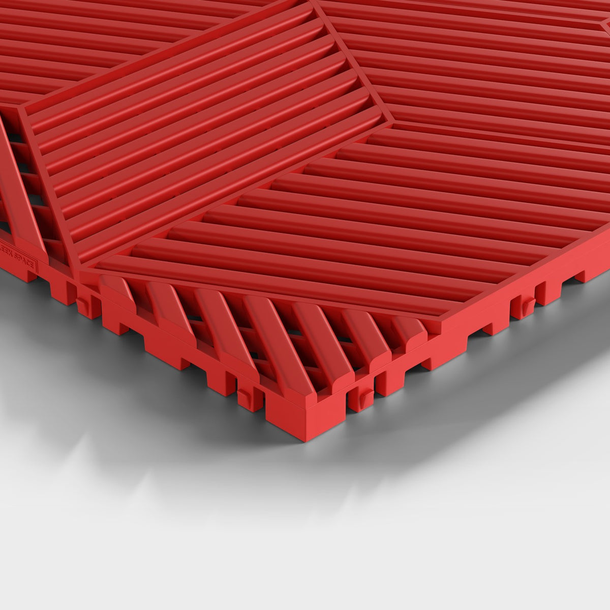ULTRACUBE tile in Rosso Red: one corner seen low and close