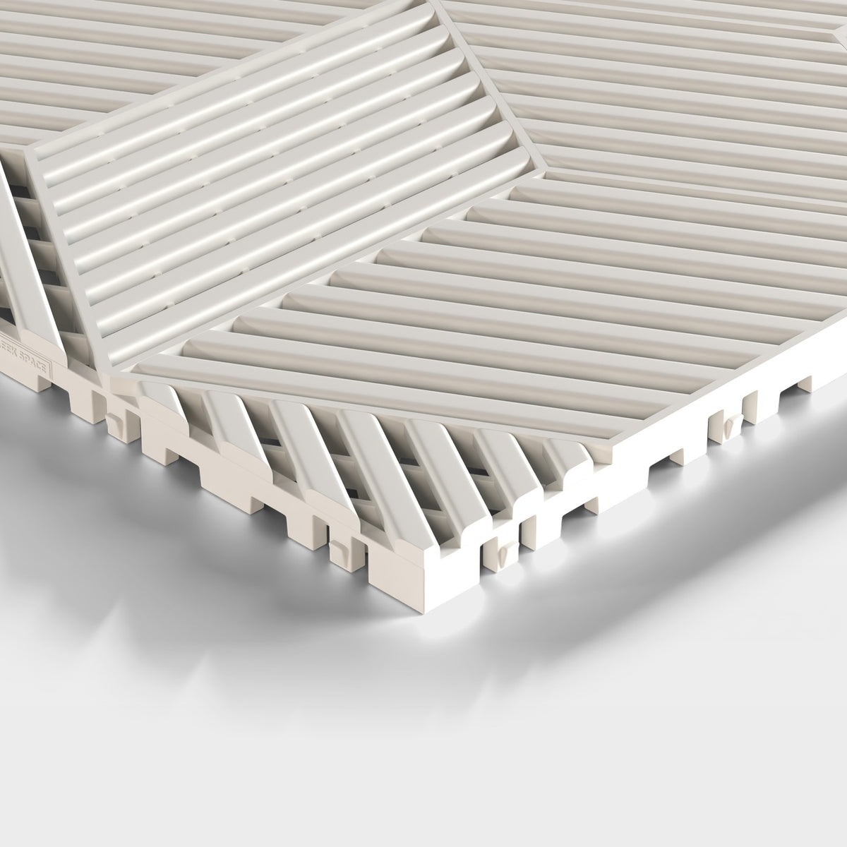 ULTRACUBE tile in Alpine White: one corner seen low and close