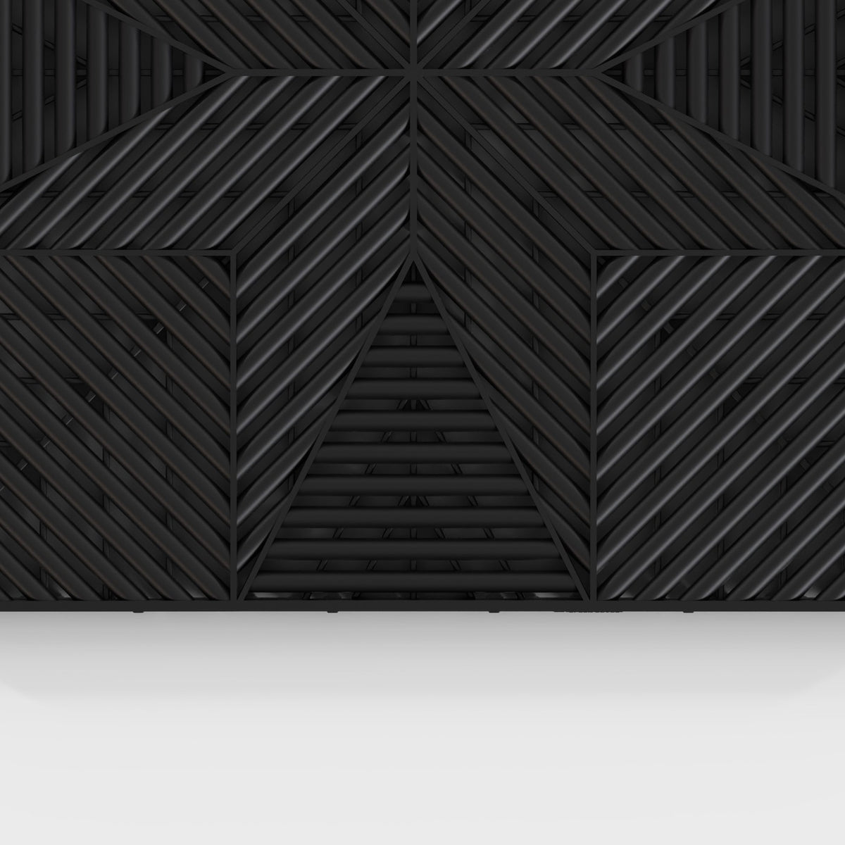 ULTRAFLUX tile in Jet Black: the star-pattern face from above