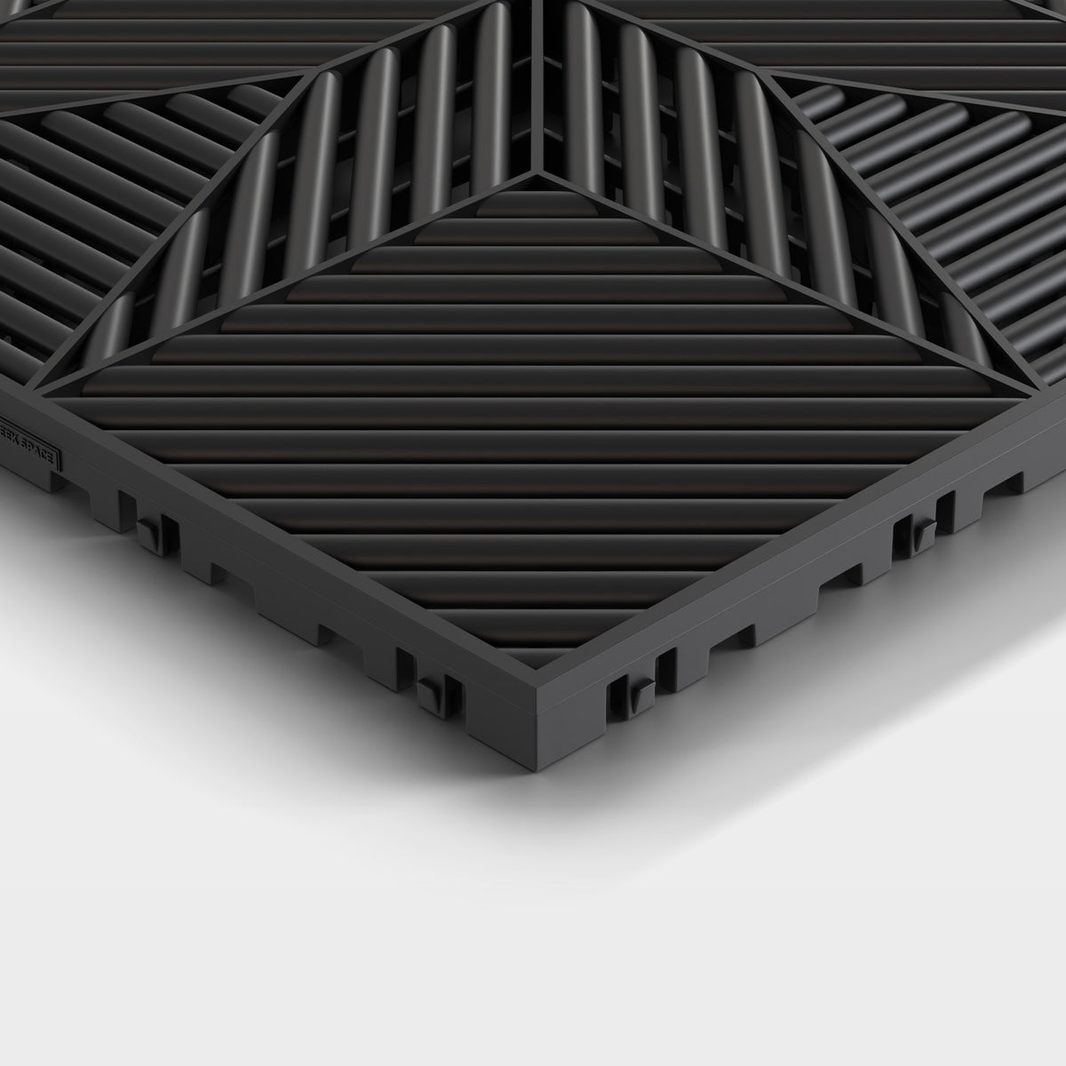 ULTRAFLUX tile in Jet Black: one corner seen low and close