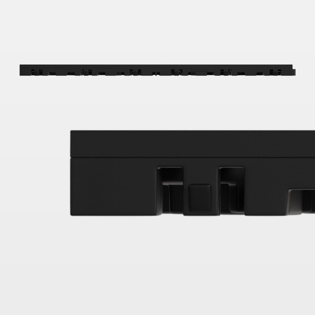 ULTRAFLUX tile in Jet Black, side on: 400 mm long and 18 mm tall