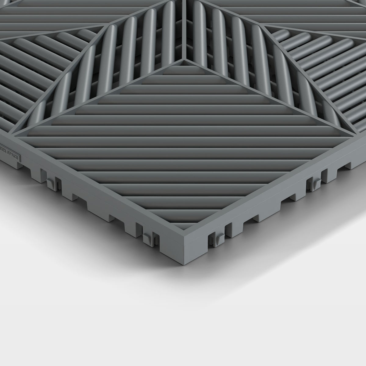 ULTRAFLUX tile in Space Grey: one corner seen low and close