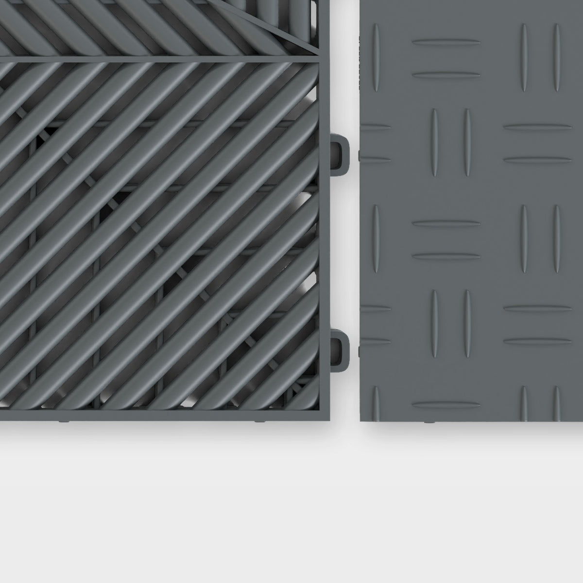 ULTRAFLUX tile in Space Grey beside an ULTRATUFF tile in Space Grey, about to click together
