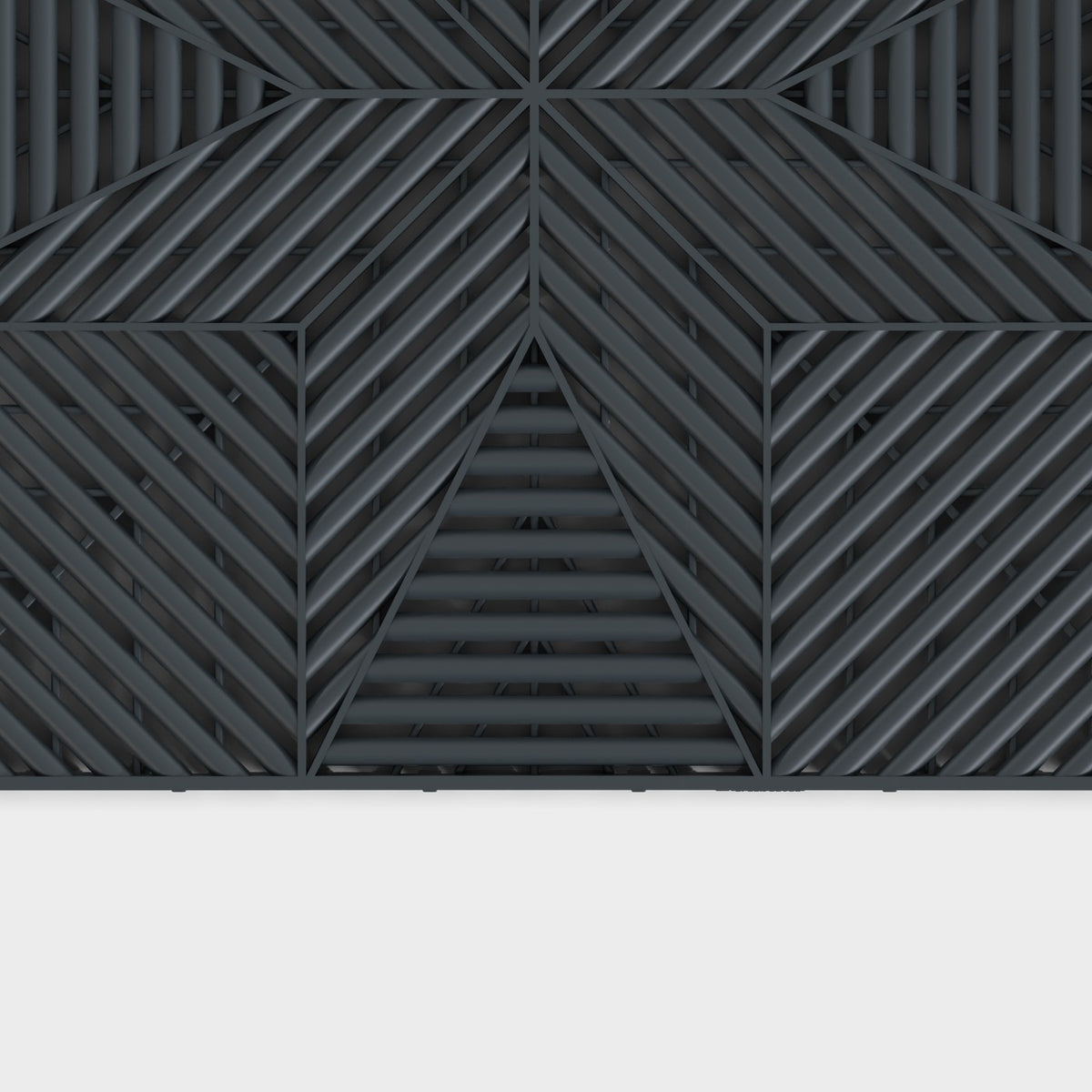 ULTRAFLUX tile in Stealth Grey: the star-pattern face from above