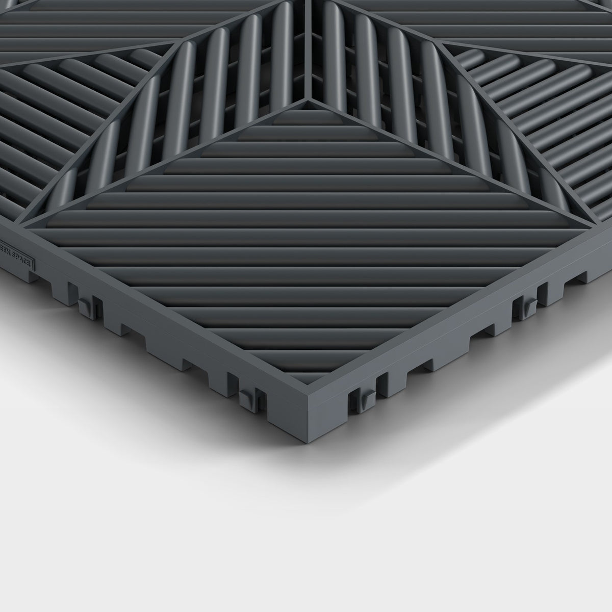 ULTRAFLUX tile in Stealth Grey: one corner seen low and close