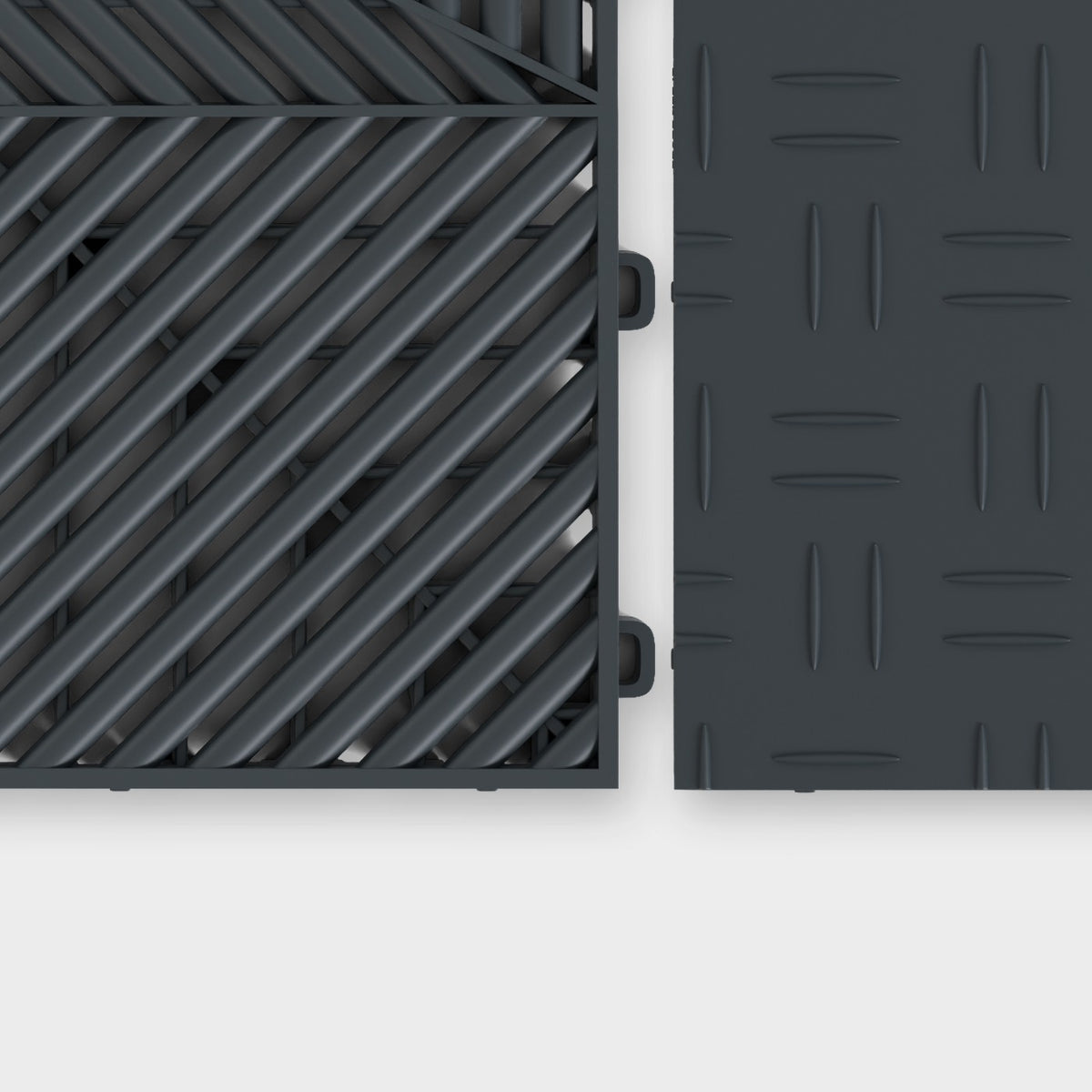 ULTRAFLUX tile in Stealth Grey beside an ULTRATUFF tile in Stealth Grey, about to click together