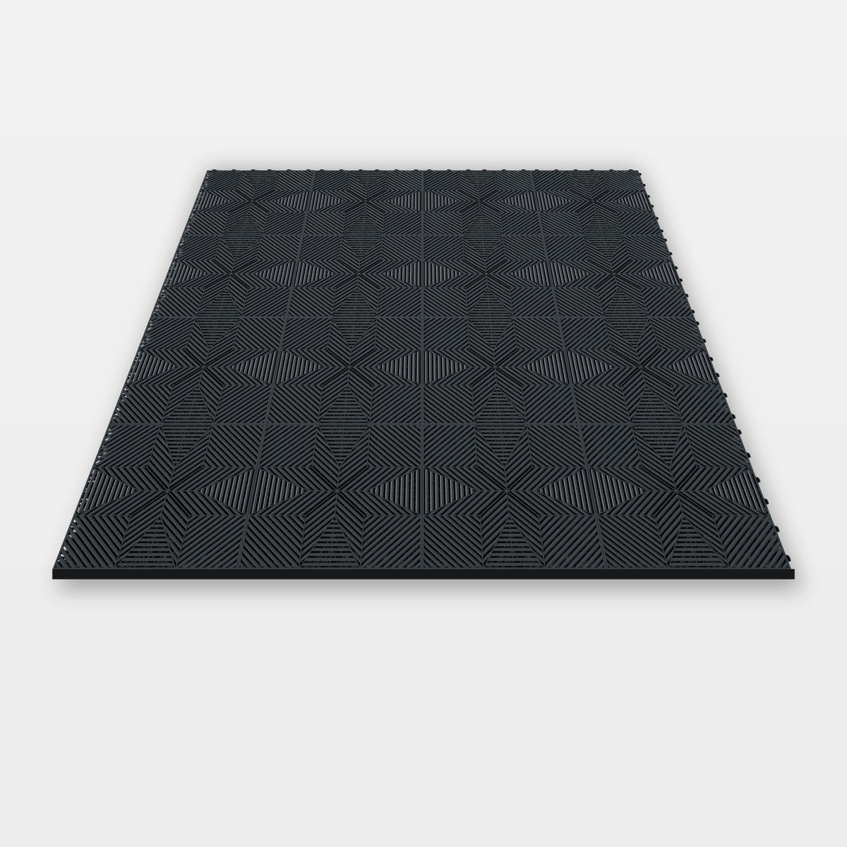 Sixteen ULTRAFLUX tiles in Stealth Grey clicked together, 1.6 m wide