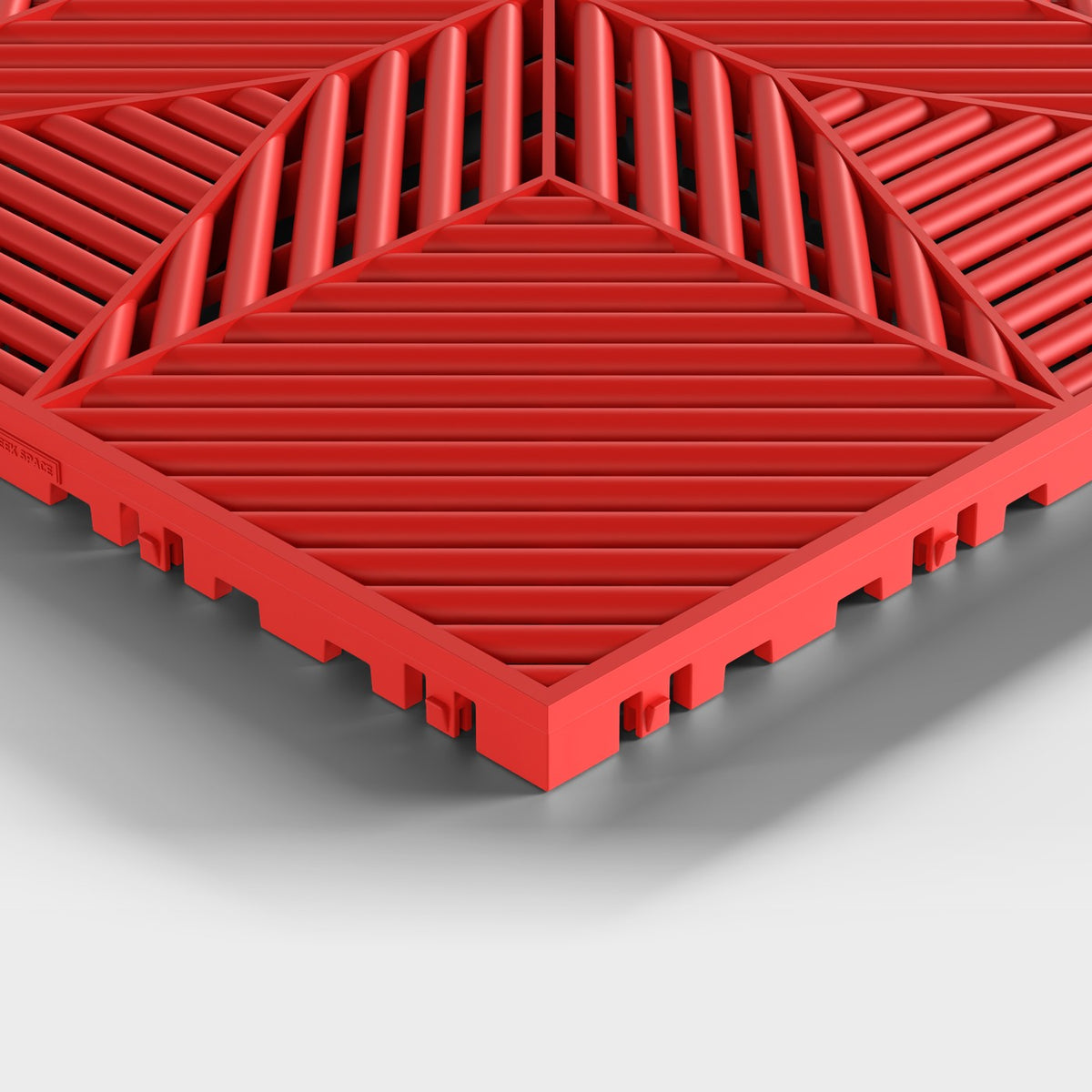 ULTRAFLUX tile in Rosso Red: one corner seen low and close