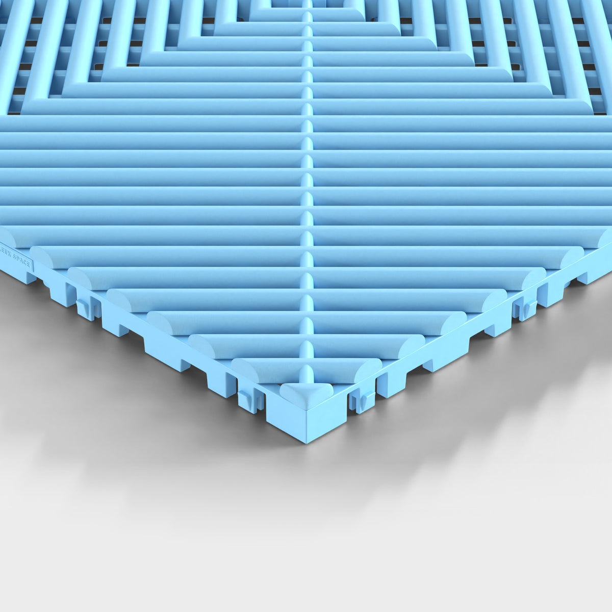 ULTRAGRID tile in Gulf Blue: one corner seen low, the open ribs and the legs under them