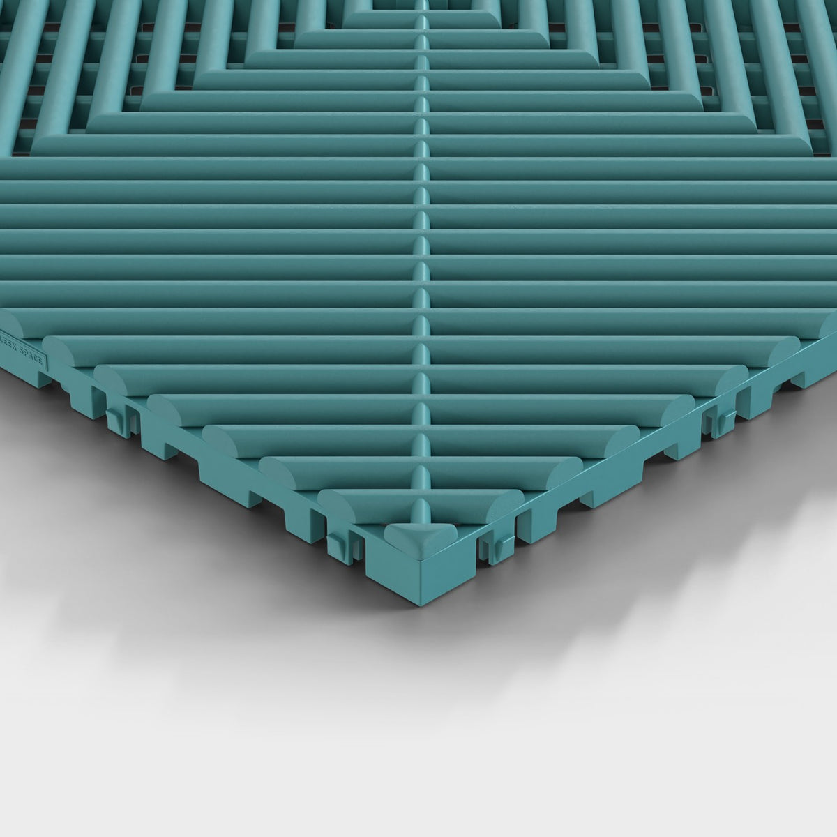 ULTRAGRID tile in Turbo Teal: one corner seen low, the open ribs and the legs under them