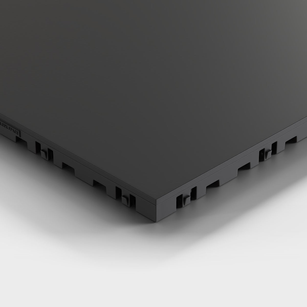 ULTRATONE tile in Jet Black: one corner seen low and close