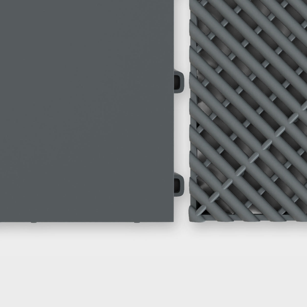 ULTRATONE tile in Space Grey beside an ULTRAGRID tile in Space Grey, about to click together