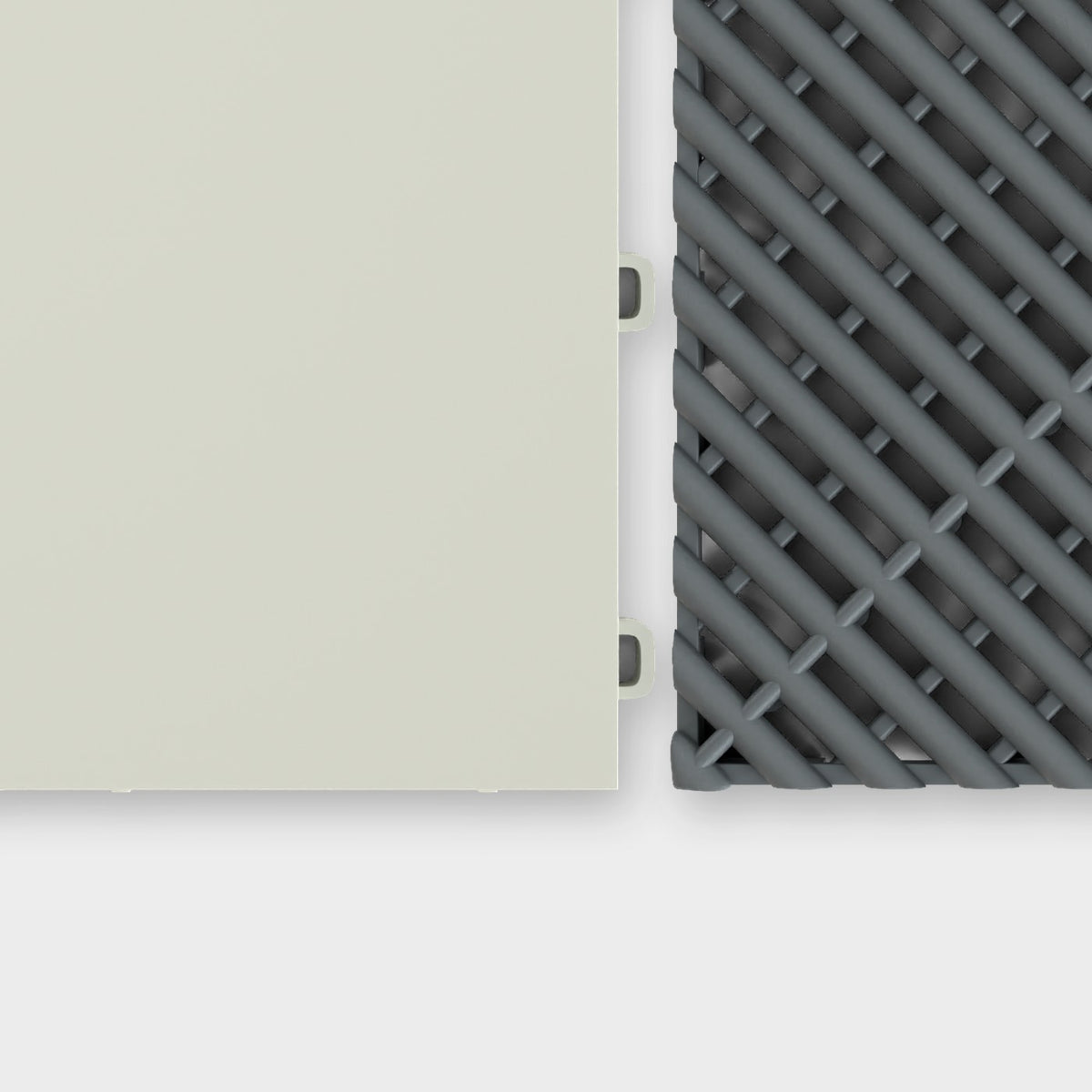 ULTRATONE tile in Coastal Grey beside an ULTRAGRID tile in Space Grey, about to click together