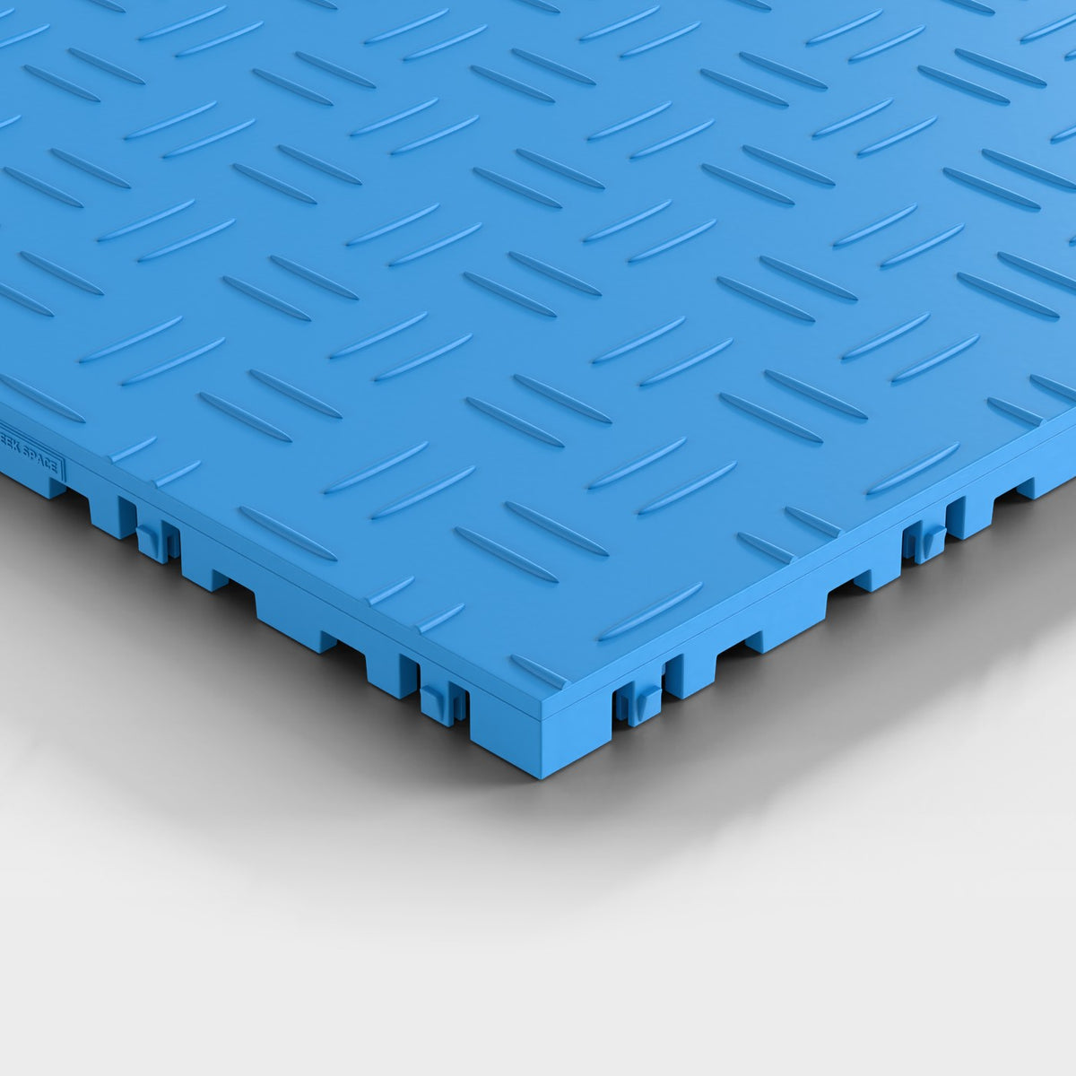 ULTRATUFF tile in Riviera Blue: one corner seen low and close