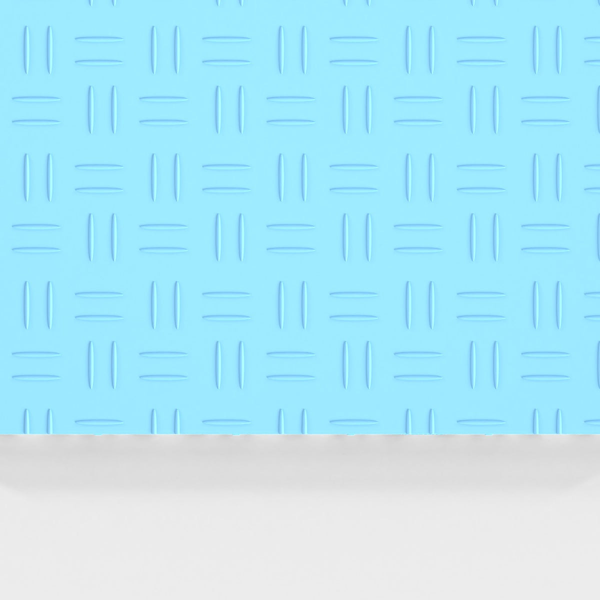 ULTRATUFF tile in Gulf Blue: the diamond-tread face from above