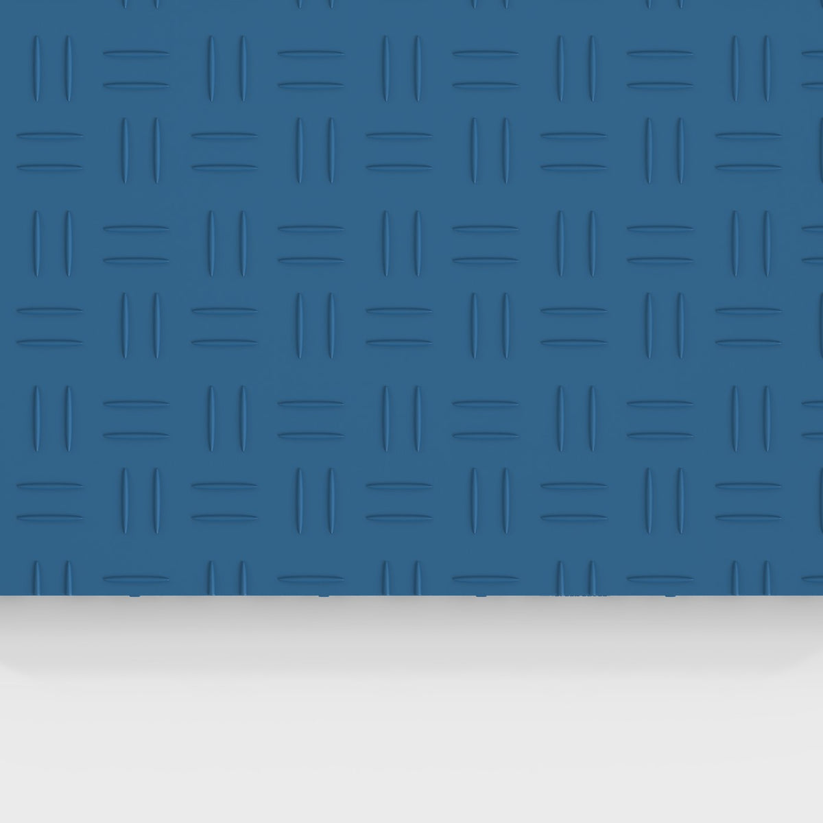 ULTRATUFF tile in Aero Blue: the diamond-tread face from above