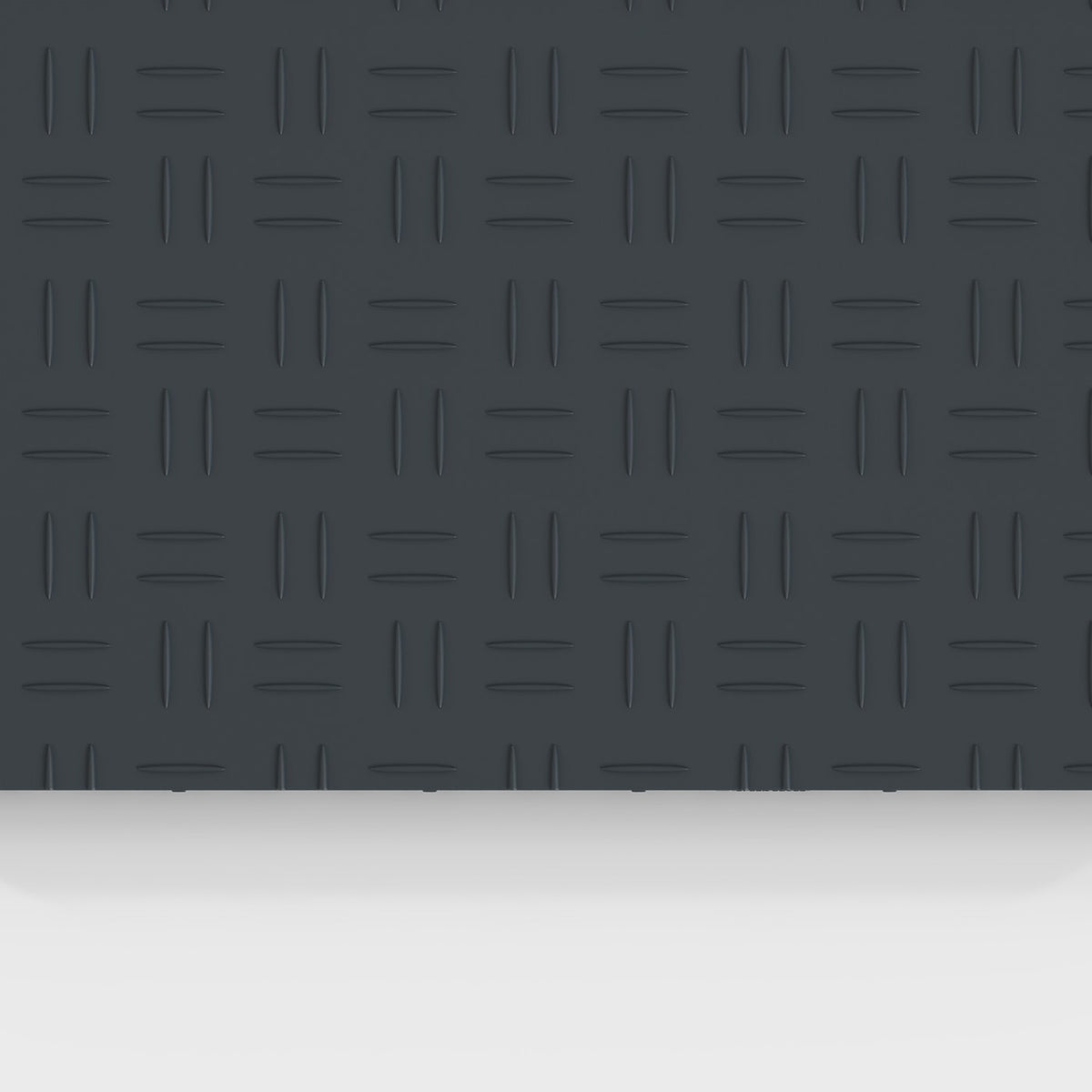 ULTRATUFF tile in Stealth Grey: the diamond-tread face from above