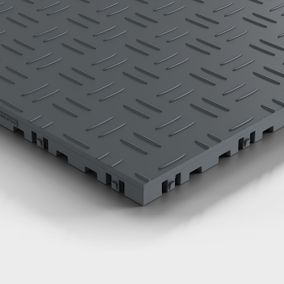 ULTRATUFF tile in Stealth Grey: one corner seen low and close