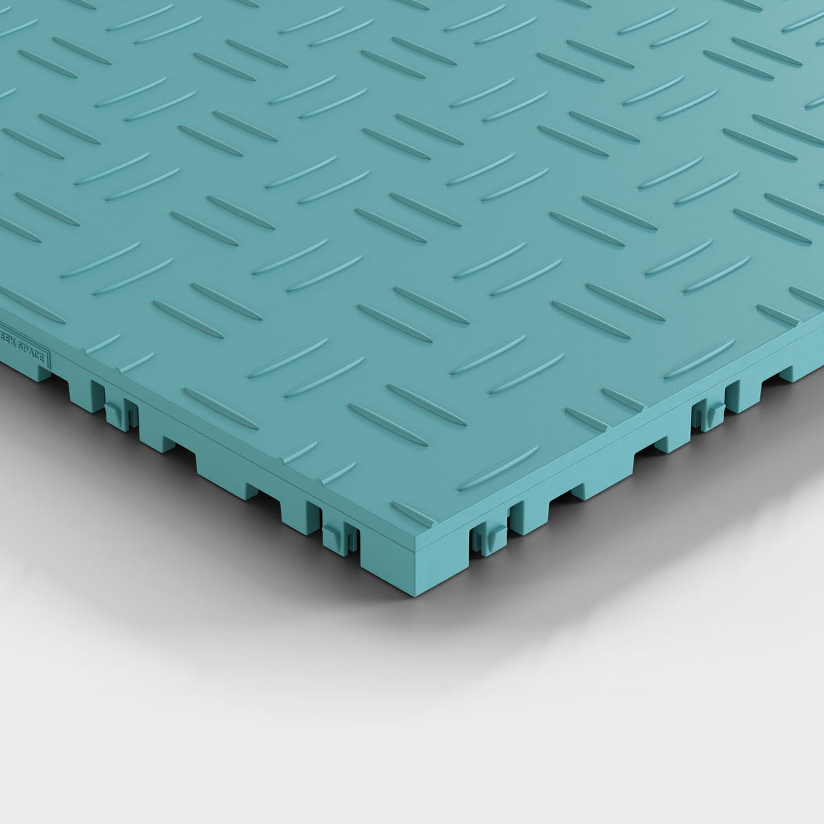 ULTRATUFF tile in Turbo Teal: one corner seen low and close