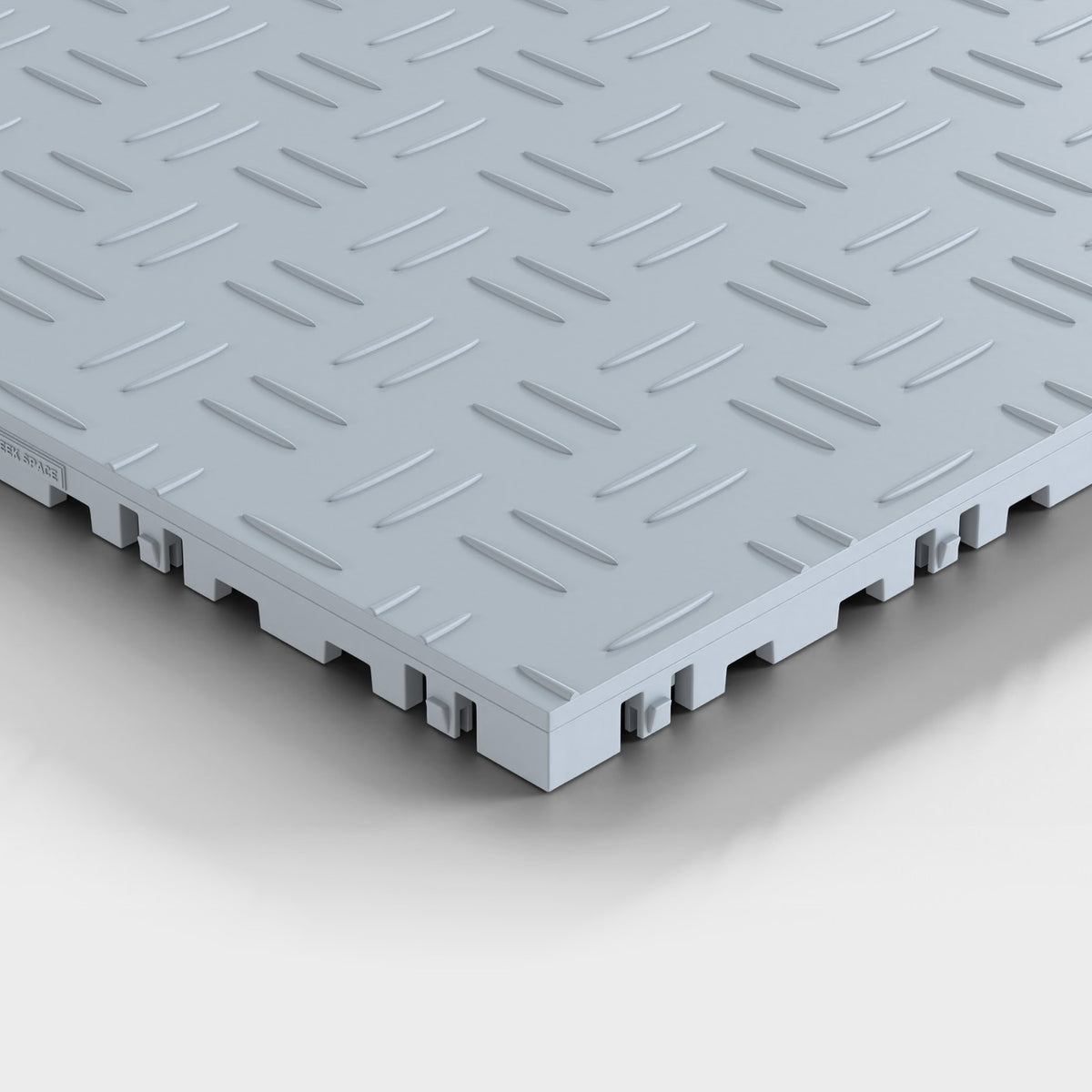 ULTRATUFF tile in Silver Grey: one corner seen low and close