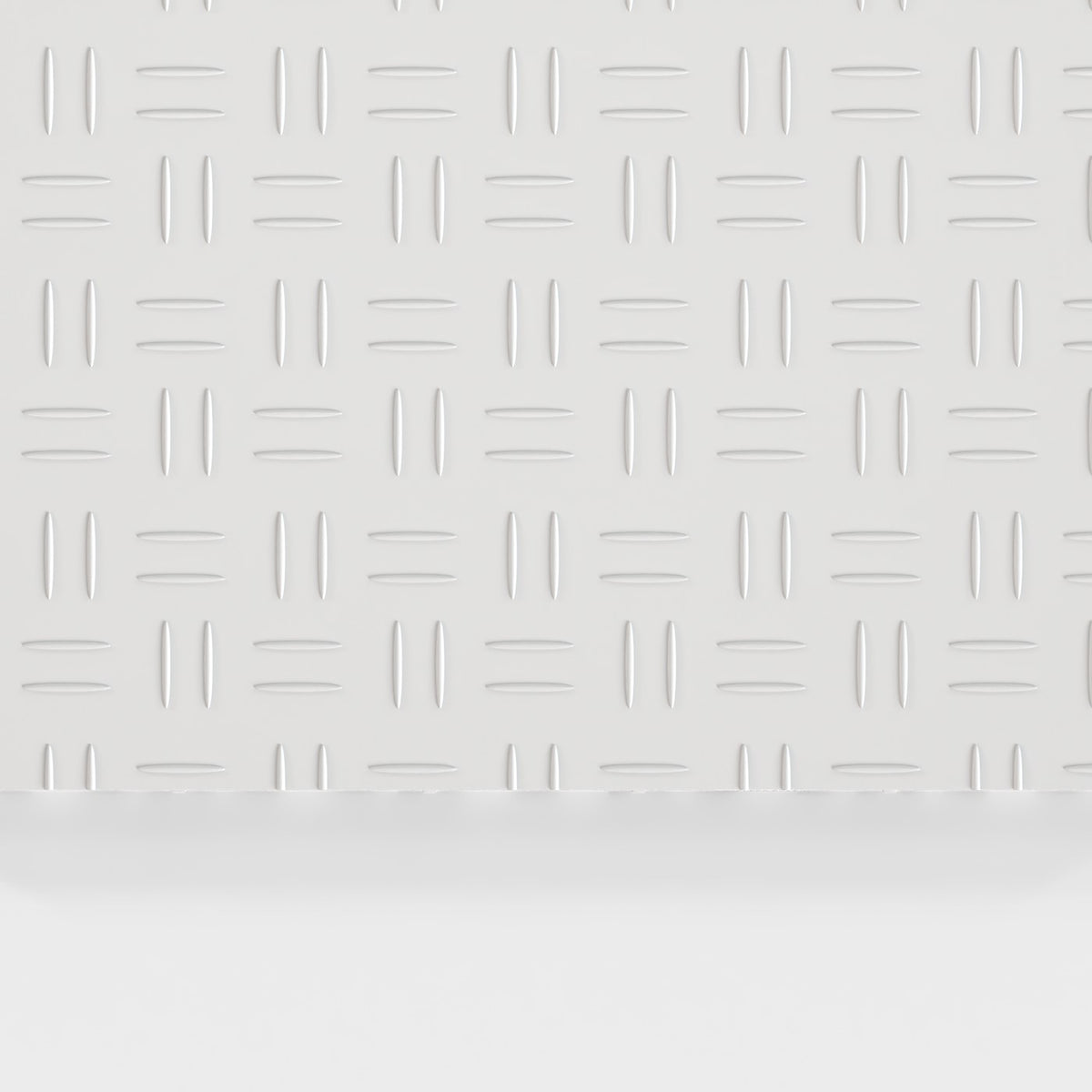 ULTRATUFF tile in Glacier Grey: the diamond-tread face from above