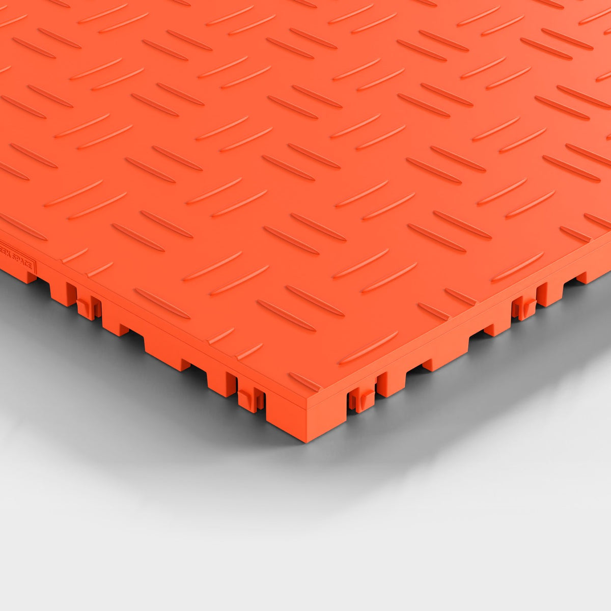 ULTRATUFF tile in Lava Orange: one corner seen low and close