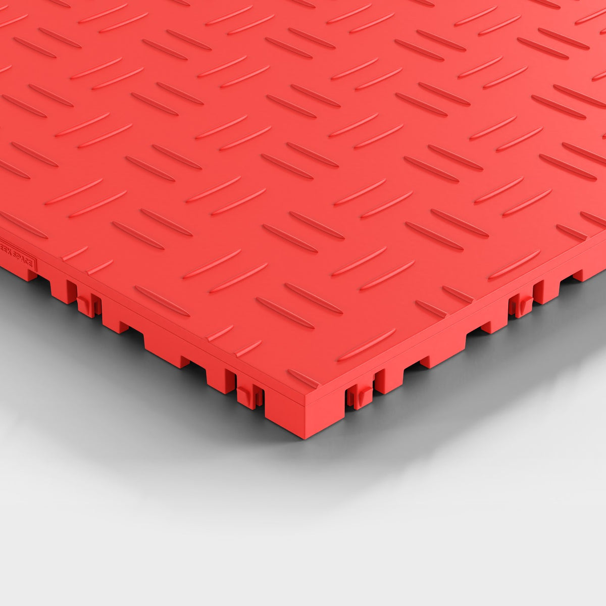 ULTRATUFF tile in Rosso Red: one corner seen low and close