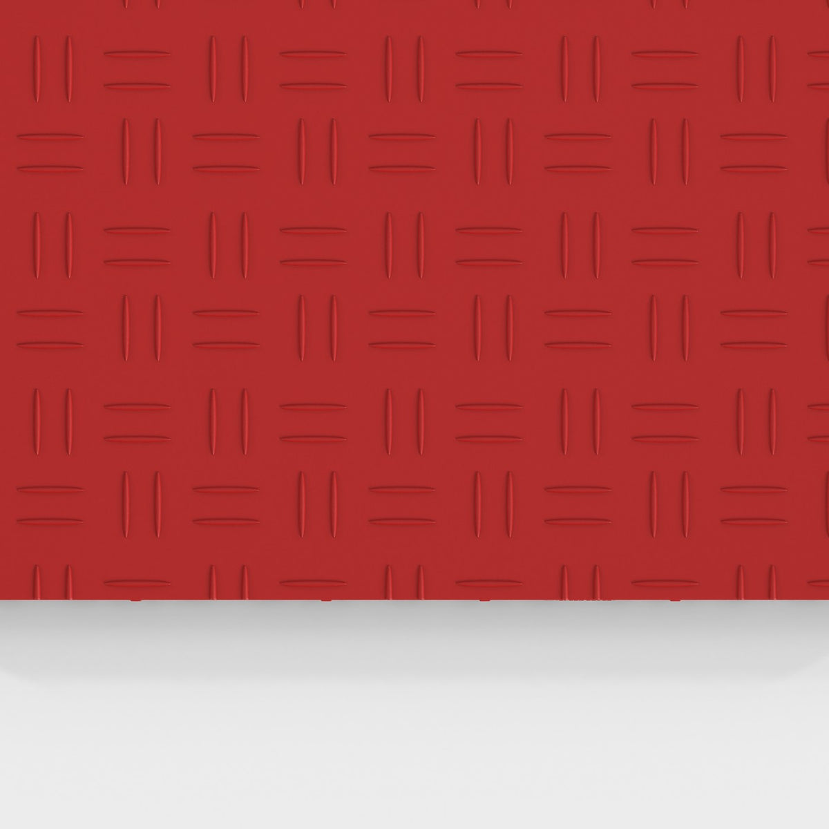 ULTRATUFF tile in Crimson Red: the diamond-tread face from above
