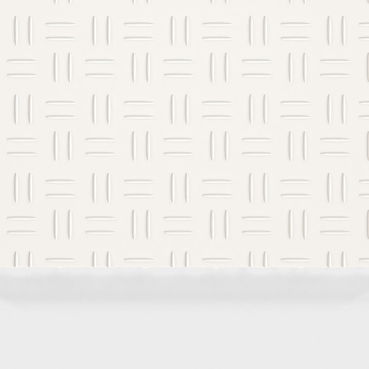 ULTRATUFF tile in Alpine White: the diamond-tread face from above