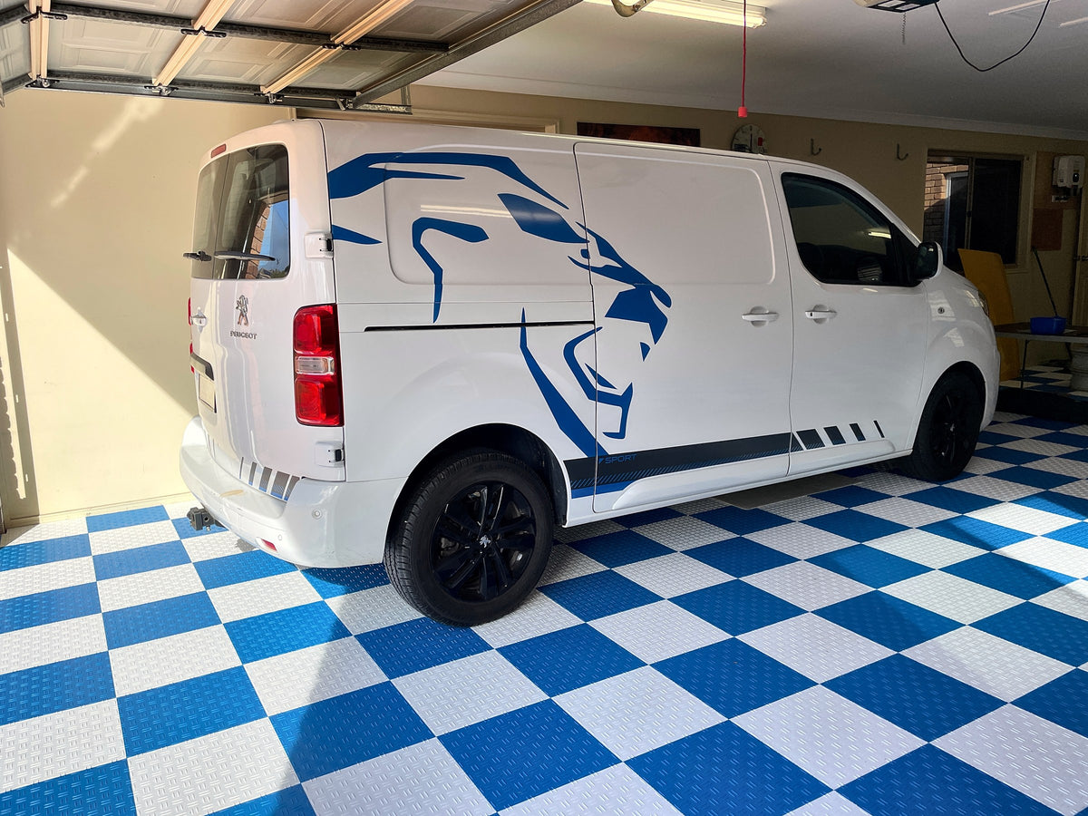 A customer's garage floor in ULTRATUFF Riviera Blue and Alpine White