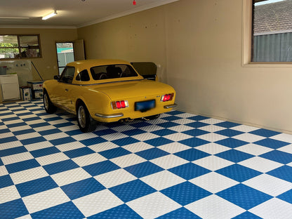 A customer's garage floor in ULTRATUFF Riviera Blue and Alpine White