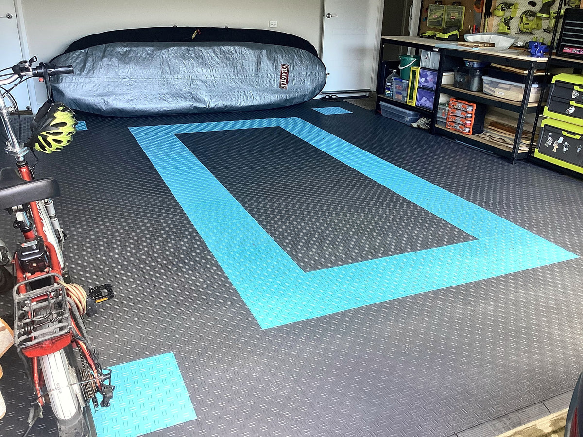 A customer's garage floor in ULTRATUFF Space Grey and Gulf Blue