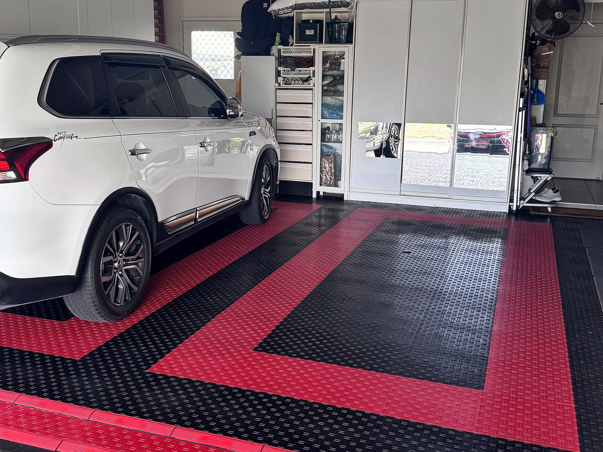 A customer's garage floor in ULTRATUFF Jet Black and Crimson Red