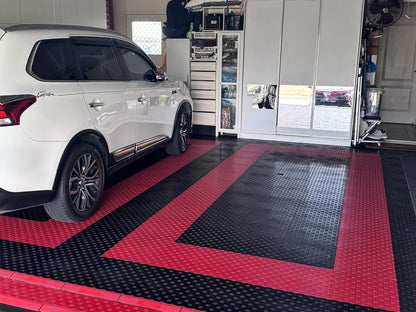 A customer's garage floor in ULTRATUFF Jet Black and Crimson Red