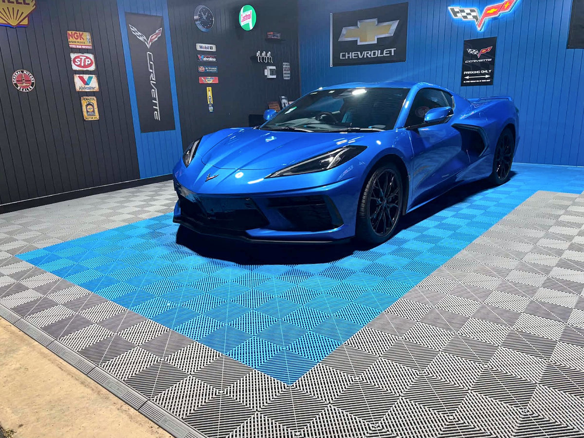 A customer's garage floor in ULTRAGRID Riviera Blue, Silver Grey and Jet Black