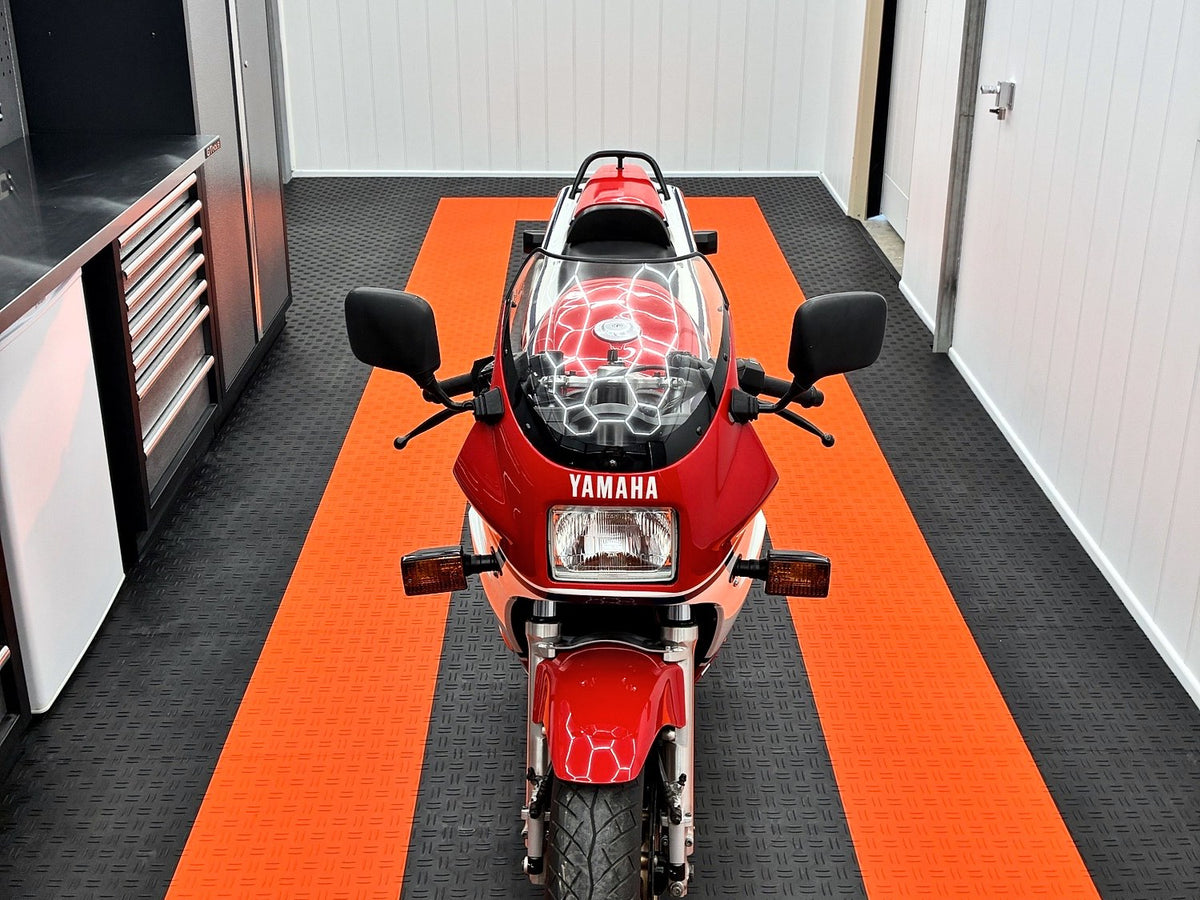 A customer's garage floor in ULTRATUFF Jet Black and Lava Orange
