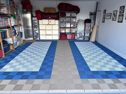 A customer's garage floor in ULTRAGRID Stone Beige, Aero Blue and Glacier Grey